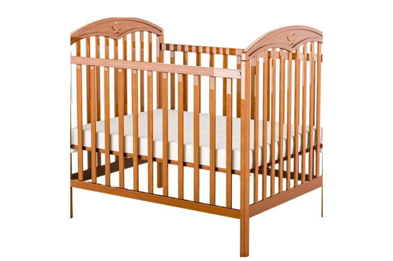 Wooden Cot with Linen